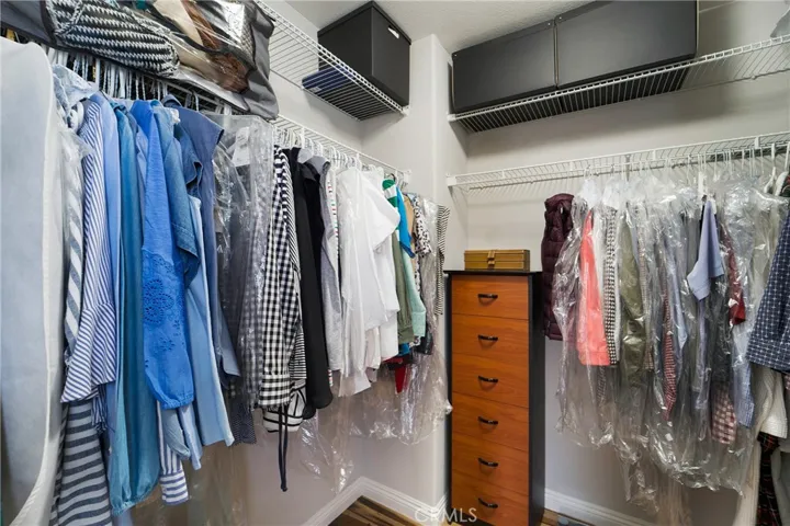 Walk in closet in the owner's suite.