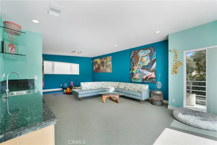Sound studio, game room, bonus room or huge fifth bedroom.