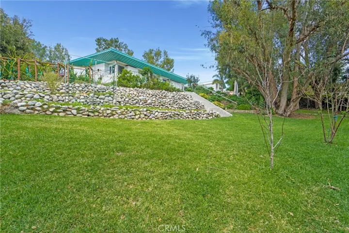 ADU, studio, play equipment, private and removed sitting area, equestrian space or plenty of additional garden beds, what will you do with all of this land?