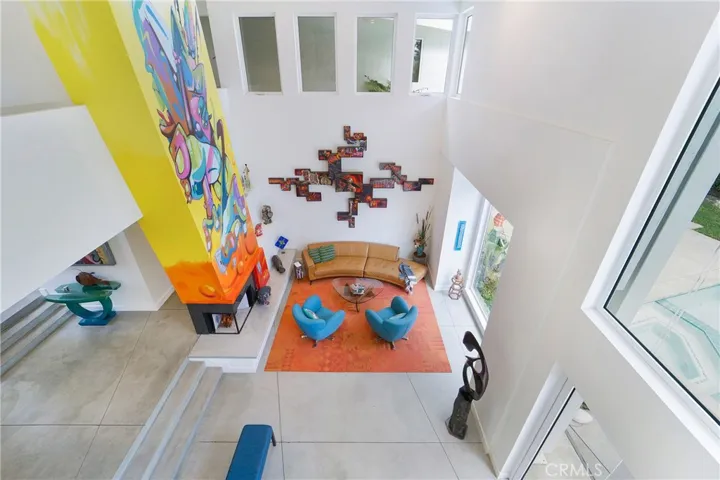 The view from second floor office to living room.