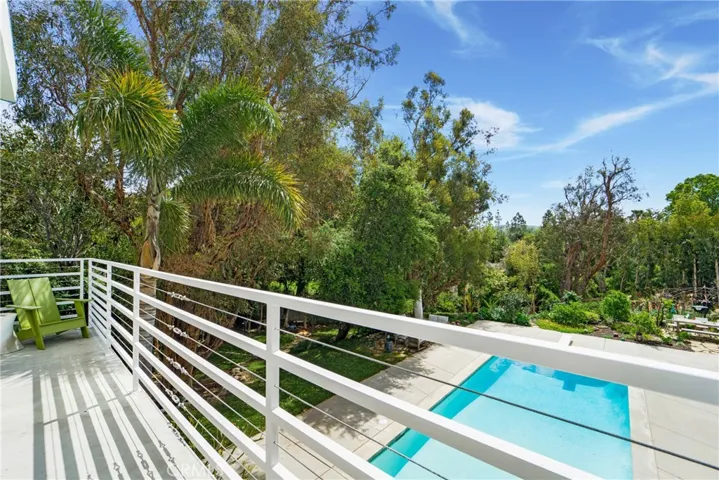 Balcony with views compliment this fantastic space!