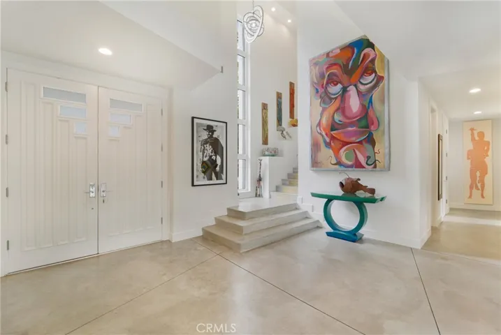Polished concrete floors run throughout the downstairs.