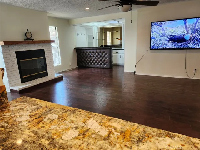 Family Room with Fireplace and Wet Bar
