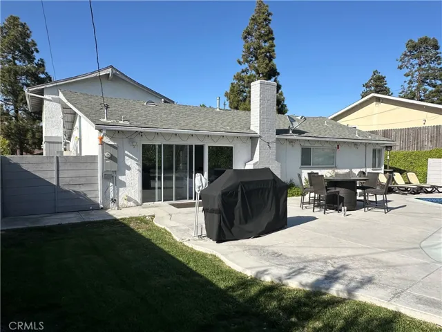 The backyard is perfect for entertaining with a new gas line to the outdoor BBQ.