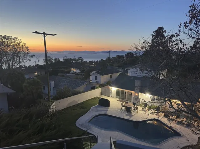 Sunset view of the ocean and coastline.