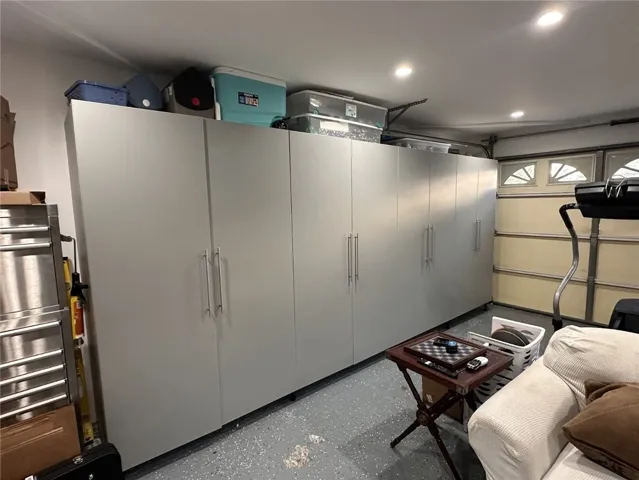 Upgraded garage with new cabinetry.