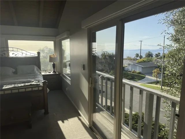 Small balcony with sliding doors.