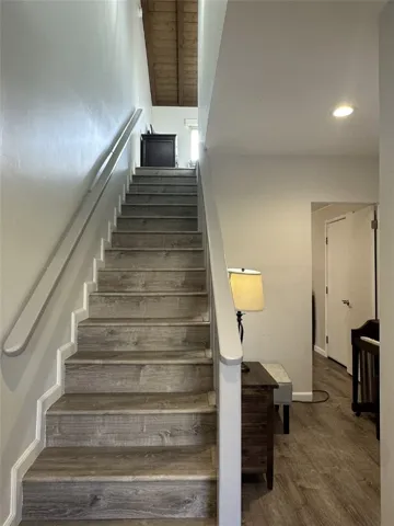 Stairs to converted primary suite.