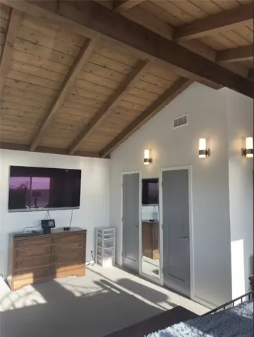 High ceilings and light, bright room.