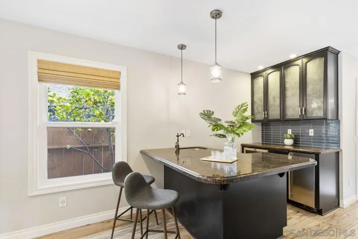Wet bar including wine fridge