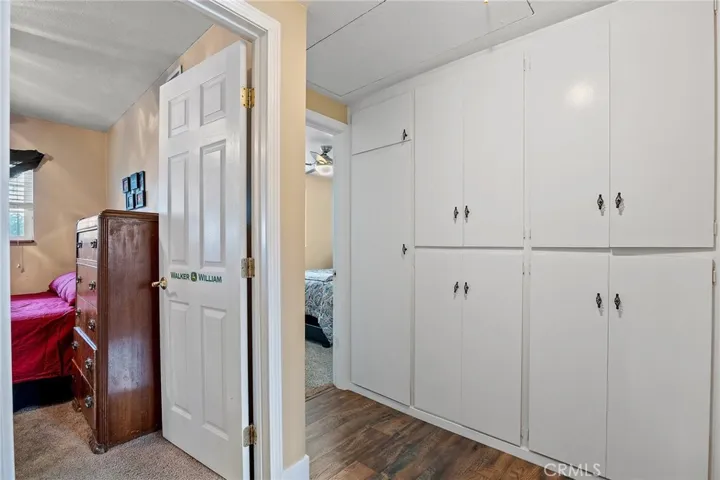Hallway with lots of cabinets