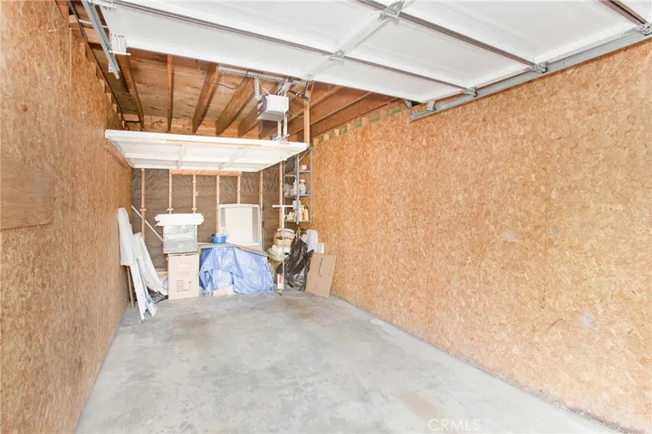 Private garage with overhead storage - note the smaller 1 bedrooms in this community only have carports!!