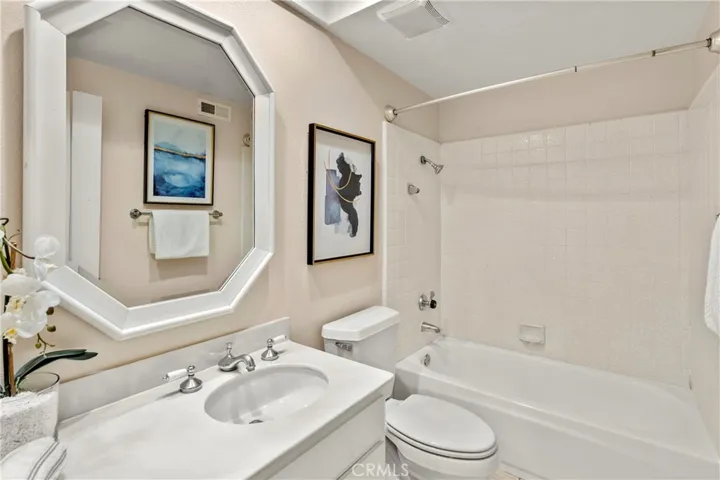 Downstairs bathroom with tub & shower combo