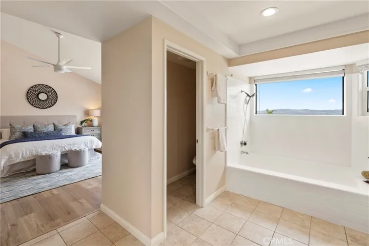 Primary bathroom with privacy toilet, tub & shower, Loads of natural light