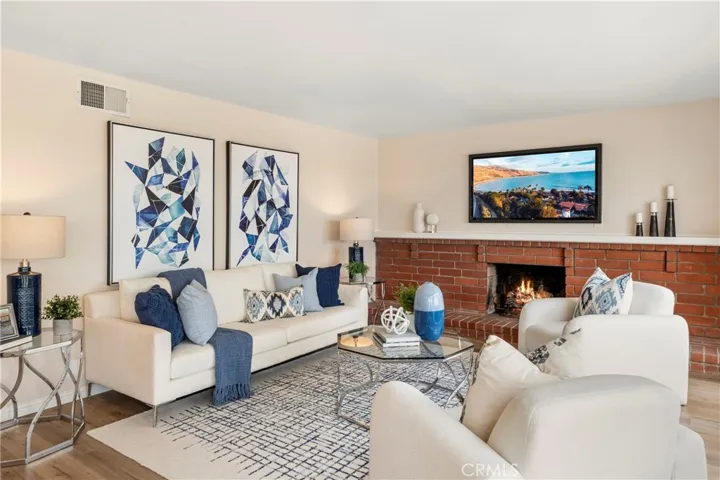 Cozy up to the fireplace or simply relax and enjoy the view