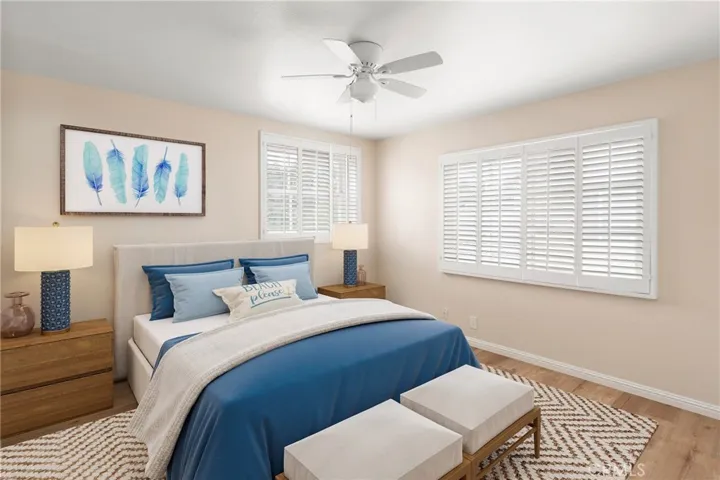 secondary bedroom with incredible views, ceiling fan and walk-in closet