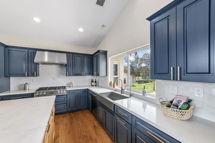 Remodeled kitchen featuring a gas stove and high-end appliances for a chef-inspired experience.