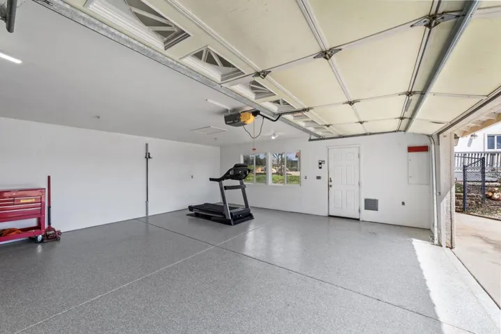 four-car garage with epoxy flooring