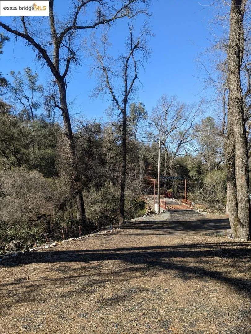 Paved entrance as standing on Green Valley Rd