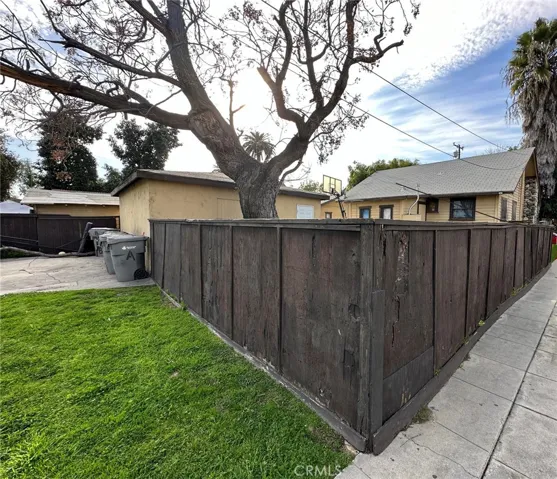 The front house has a huge private fenced backyard in which is a 2-car garage.