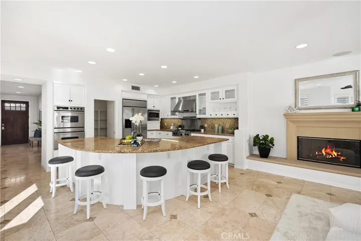 Large island in kitchen with bar seating