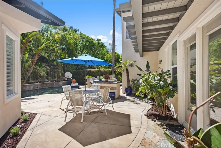 Outside patio with built in BBQ and Pool