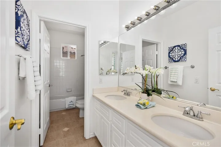 Upstairs large full bathroom with tub and shower combination