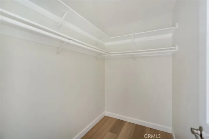 Walk-In Closet in Larger Bedroom