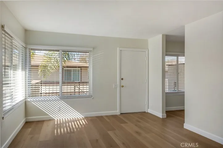View of Living Room looking to Front Door and Windows