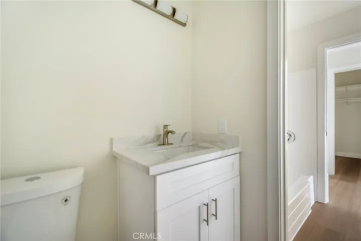 New Vanity, New Quartz Counter Top and New Toilet in Hallway Bathroom