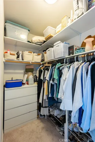 Walk-in closet in primary suite