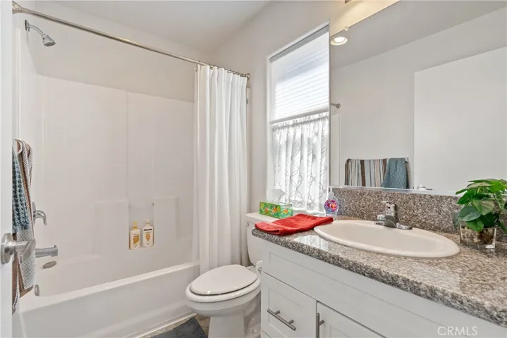 Second full bath off hallway to second bedroom