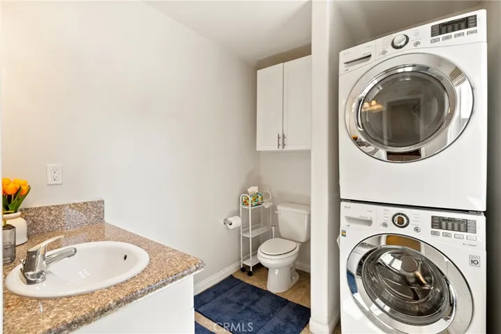 Convenient half bath and laundry on entry level