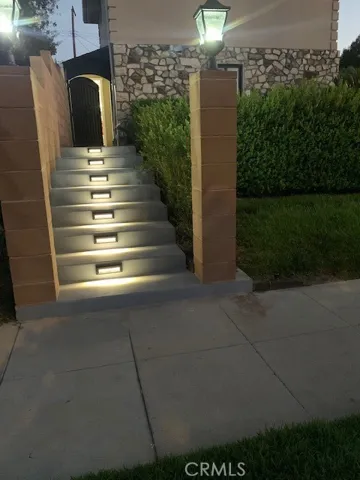 Lighted stairway to the gate