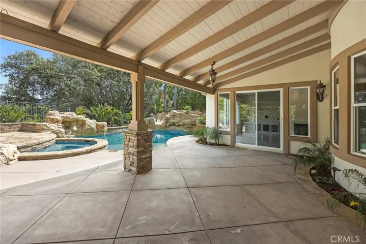 THIS SOLID PATIO COVER KEEPS THE RAIN AND THE SNOW OFF YOUR PATIO