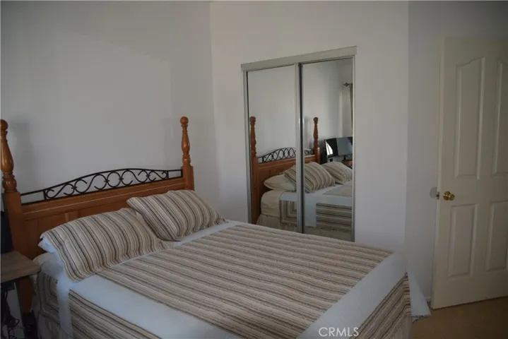 BEDROOM 2 WITH MIRRORED CLOSET