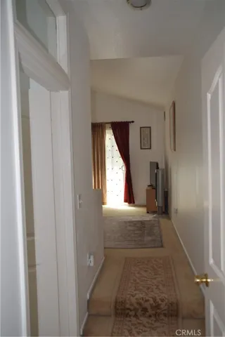 HALLWAY TO PRIMARY BEDROOM