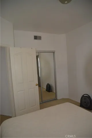 BEDROOM 3 WITH MIRRORED CLOSET