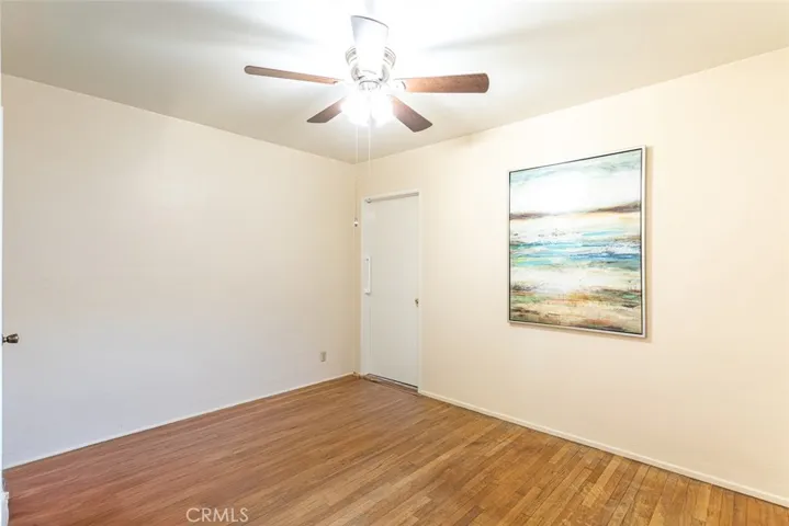 Bedroom at end of hallway with direct access to full bath
