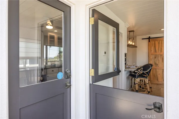 Entrance to ADU.  Two Doors.  Dutch Door To Living Rm.  Door To Left To ADU Office.
