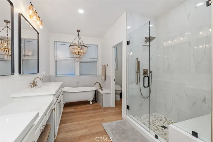 Primary bath complete with soaking tub and huge walk in shower all recently remodeled