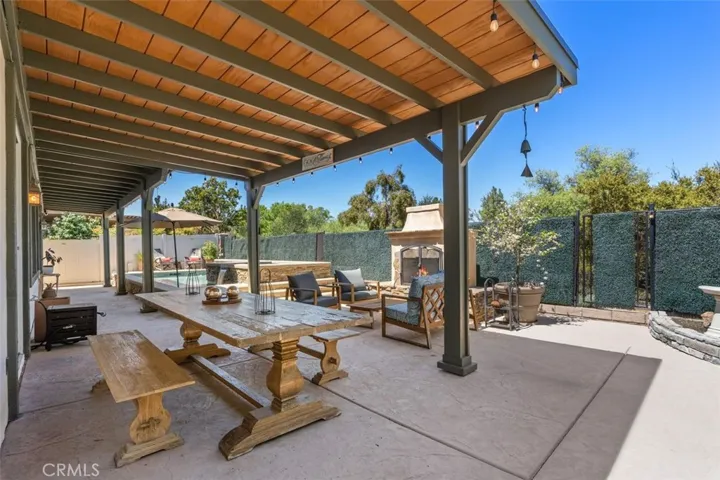 Custom designed back yard, Gate to the right leading to the Trail system in the green space behind the home, no neighbor
