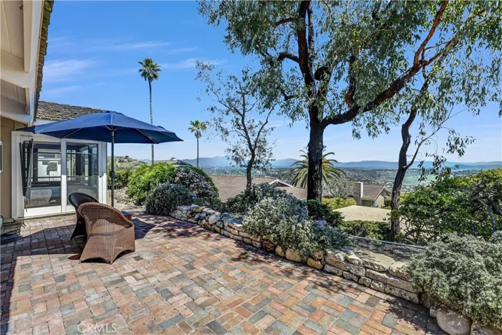 Wrap around patio with privacy and ever-changing views from Saddleback Mountain, El Niguel Country Club to the Southern Coastline off the Pacific Ocean. Beautiful night lights and sunrises