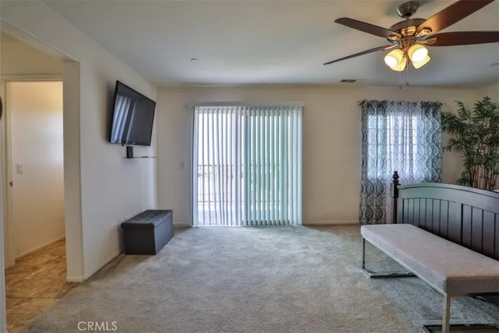 Primary BR with sliding door to balcony