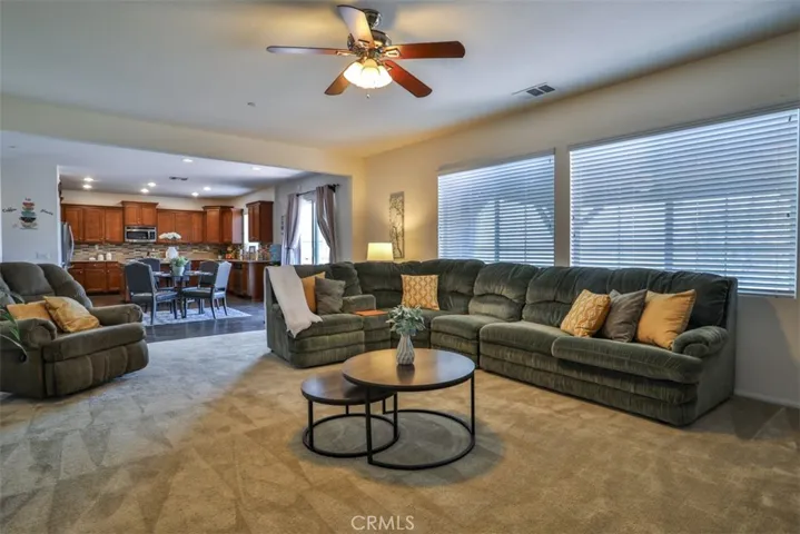 Family room with ceiling fan