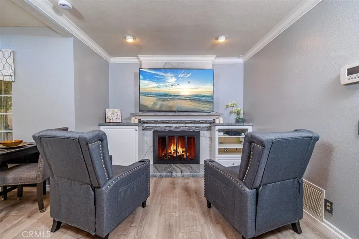 So cozy sitting by the fire and watching a movie or show, Family Room area with bult-ins!