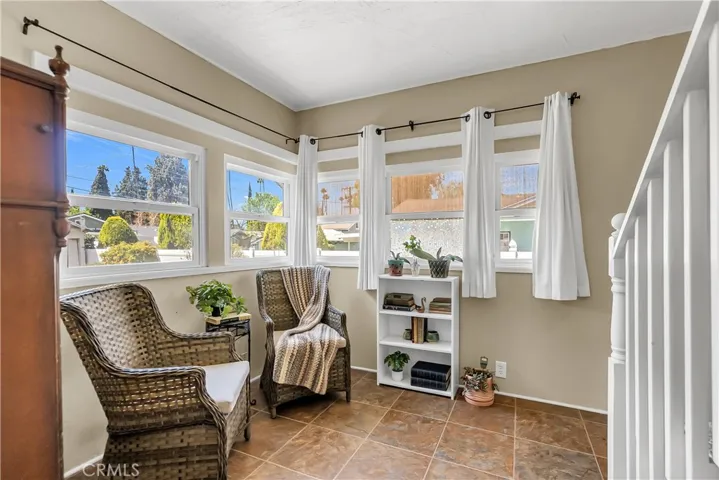 This used to be a bedroom, but is now a sunroom/office due to the stairs that were added to reach the 2nd floor.