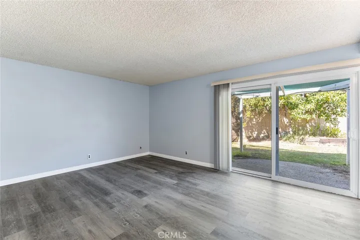 Primary bedroom opens to backyard