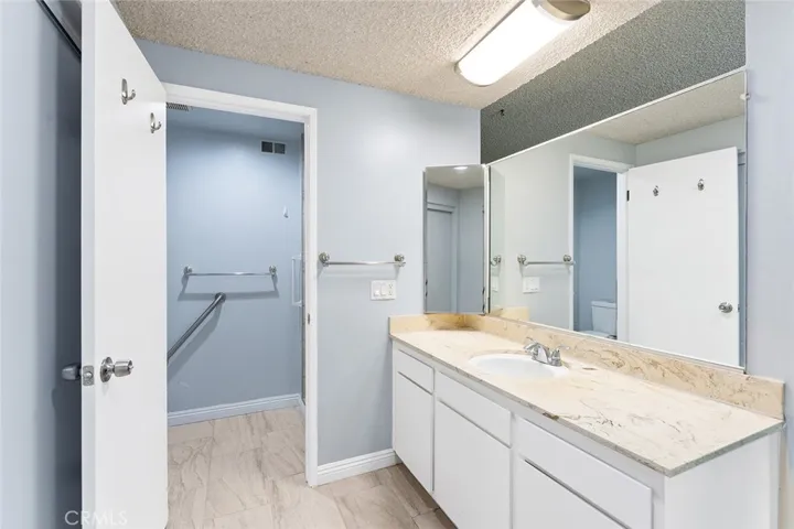 Primary bathroom with remodeled shower