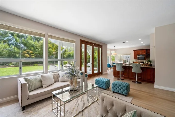 The large family room with views and french doors to the large backyard.